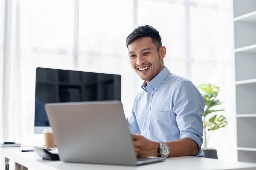 Working adult studying a short accredited microcredential course online in Malaysia